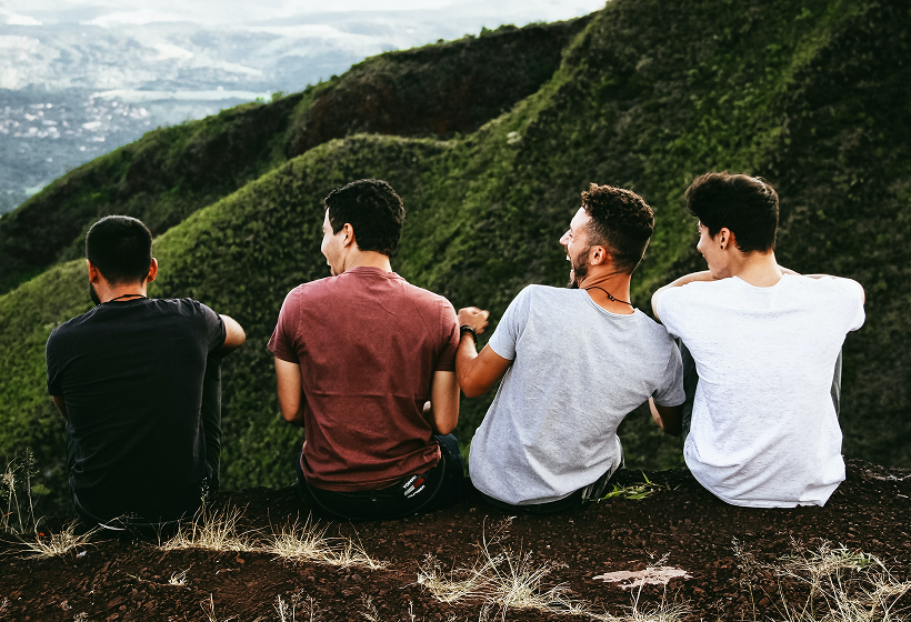 Four men on hillside